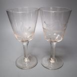 A pair of Victorian wine glasses, etched with game birds, height 21cm