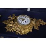 A Louis XV ormolu cartel clock case with later movement