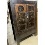 A Chinese lacquer two door cabinet, width 117cm, depth 55cm, height 179cm