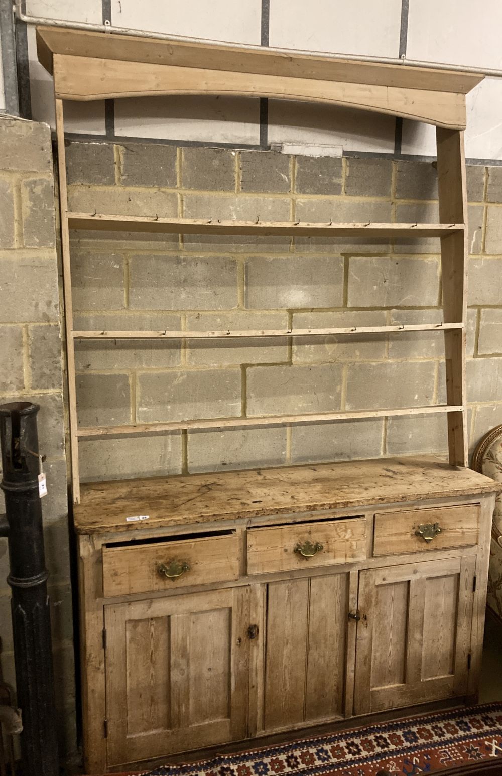 A Victorian pine dresser, width 160cm, depth 44cm, height 250cm