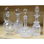 Three various cut glass decanters and stoppers and a similar claret jug and stopper(4), tallest