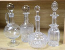 Three various cut glass decanters and stoppers and a similar claret jug and stopper(4), tallest