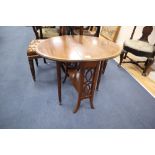 An Edwardian mahogany and satinwood banded Sutherland table, 78cm extended, height 62cm