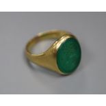 An early 20th century 18ct gold, and intaglio chrysophase? oval ring, carved with the head of a lady