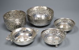 A Persian white metal bowl, a Victorian silver sugar bowl, pair of small silver nut dishes and a