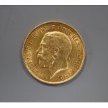 A George V 1911 gold half sovereign.