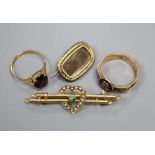 A Regency mourning brooch, a Victorian 9ct gold mourning ring, garnet ring and 15ct bar brooch.