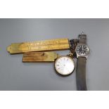 Two folding rules, a pocket watch and a CWC wrist watch