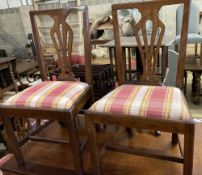 A set of six George III country Chippendale mahogany dining chairs, with pierced splats and drop