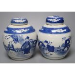 A pair of Chinese porcelain blue and white jars and covers, Qianlong marks but c.1900, 18cm high