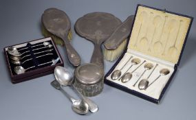 A cased set of six silver coffee spoons, silver mounted dressing table items etc.