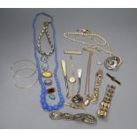 A lady's 9ct gold watch on a 9ct strap, a 9ct bar brooch, a 9ct ropetwist chain, a Regency