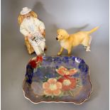 A Beswick porcelain labrador, Doulton figure 'Taking things easy' HN2680 and a Royal Doulton