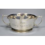 A George V silver two handled christening porringer, Wilson & Gill, Birmingham, 1932, with