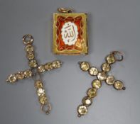 A Middle Eastern yellow metal and enamel small box modelled as a book, 32mm, (end missing?) and