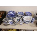 A group of 19th century blue and white pottery dishes, plates, jugs, together with an enamelled