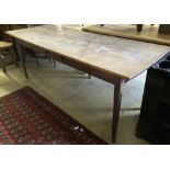 A cherrywood French farmhouse table with side and end drawers, width 200cm, depth 74cm, height 75cm