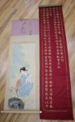 A Chinese claret silk wall hanging, painted with gilt script, drop 246cm, and a Japanese scroll,