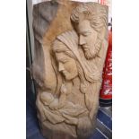 A carved wood relief of Joseph, Mary and Jesus, height 67cm