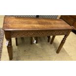 A Victorian Gothic style oak side table with drawer, width 111cm, depth 41cm, height 67cm (cut
