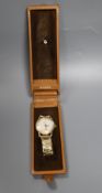 A gentleman's late 1950's 9ct gold Omega manual wind wrist watch, movement c.267, on associated