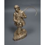 After Rowland Chadwick, a silver figure of an angler, maker's mark HL, Sheffield 1987 (filled), 20.