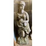 A reconstituted stone garden figure of a girl with basket of flowers, height 120cm