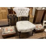 A pair of Victorian mahogany framed tapestry topped gout stools and a later Victorian button