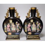 A pair of Victorian enamelled black glazed moonflasks, attributed to Dudson, height 23cm