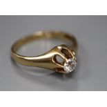 A 14k and claw set solitaire diamond ring, size I, gross 2.4 grams.CONDITION: Stone size