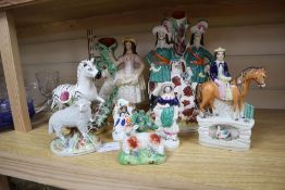 Seven Staffordshire figures, including flatbacks and a Continental Staffordshire style figure of a