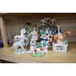 Seven Staffordshire figures, including flatbacks and a Continental Staffordshire style figure of a