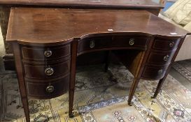 An Edwardian mahogany kneehole dressing table, width 128cm, depth 64cm, height 75cm