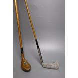 A vintage 'Halley' St Andrews laminated hickory shafted putter and a Pin-hi brand putter with faux
