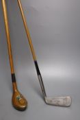 A vintage 'Halley' St Andrews laminated hickory shafted putter and a Pin-hi brand putter with faux