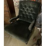An Edwardian green velvet club armchair, width 75cm, depth 80cm, height 90cm