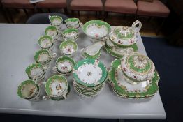 A Victorian Nash & Co part tea service, with floral decoration on a gilt-heightened apple green