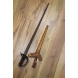 A Victorian military sword, 97cm and a 20th century kris, 58cm