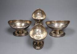 A set of four George III silver navette shaped pedestal salts, Thomas Wallis II, London, 1801,