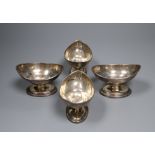 A set of four George III silver navette shaped pedestal salts, Thomas Wallis II, London, 1801,