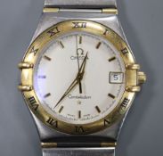 A gentleman's 1980's? stainless steel and yellow metal Omega Constellation quartz wrist watch, (