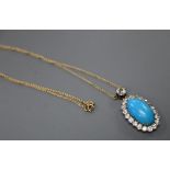 A yellow metal, turquoise and diamond set oval pendant necklace, pendant 3cm, gross 6 grams, the