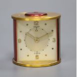 A Jaeger miniature clockwork timepiece, height 5cm, in original box