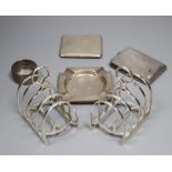 Small silver and other items including a pair of toast racks, four knife rests, ashtrays, 19th