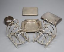 Small silver and other items including a pair of toast racks, four knife rests, ashtrays, 19th