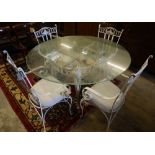 A French cast and wrought iron circular glass top garden table and four chairs, table diameter