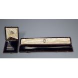 A cased Victorian part textured silver miniature presentation oar, 17.7cm and similar rudder, by
