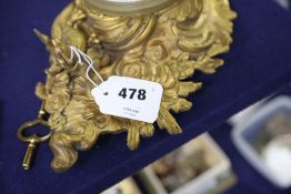 A Louis XV ormolu cartel clock case with later movement