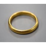A 22ct yellow gold wedding ring, size M, 4.4 grams.