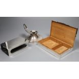 An 800 standard matchbox holder, and cigarette box and a silver capstan inkwell.